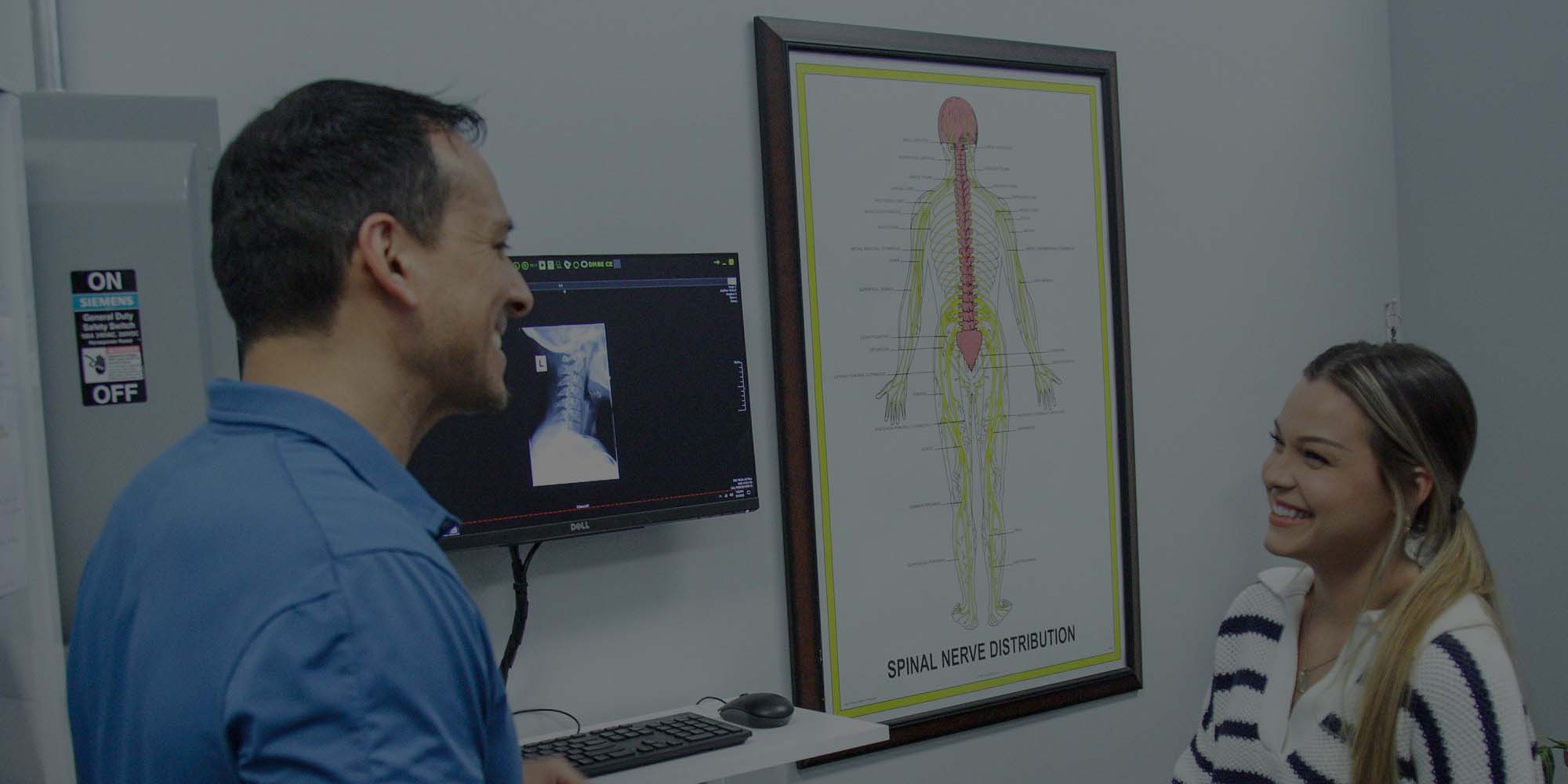 Chiropractor Wichita KS Randy Babcock With Patient